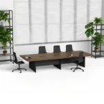 high end executive desk that can be joined to form a conference table, featuring a dark wood grain design